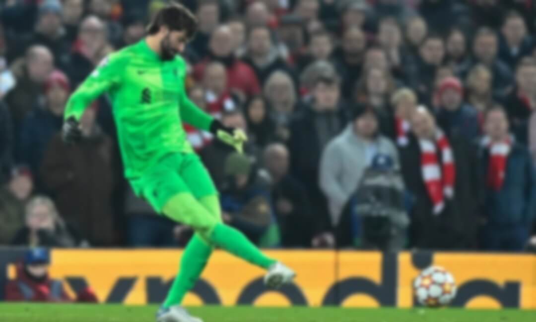 Liverpool goalkeeper Alisson Becker comes out the other side of his ball control, not unlike a goalkeeper!
